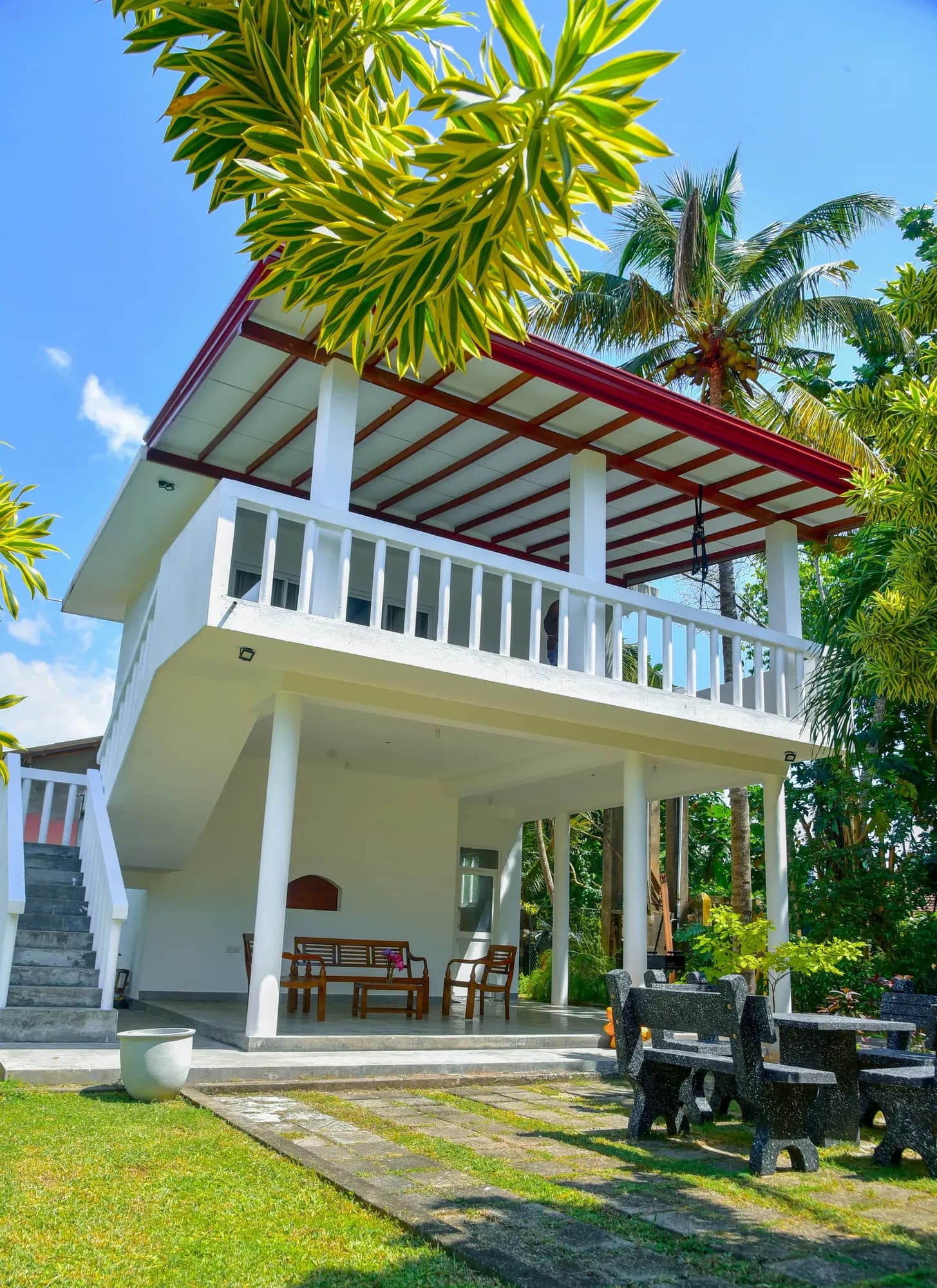 Bungalow exterior with lush garden